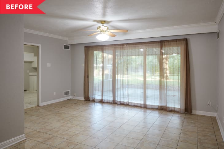 Before: Large empty room with sliding glass doors and tan tile floor