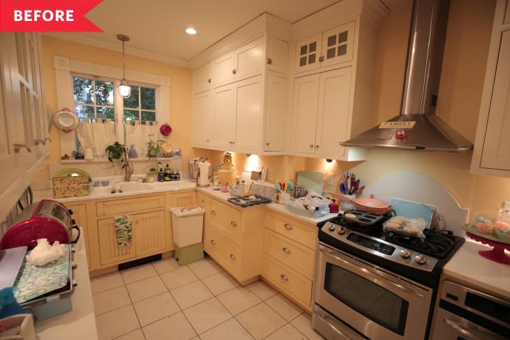 Before: Kitchen with yellow walls and lower cabinets