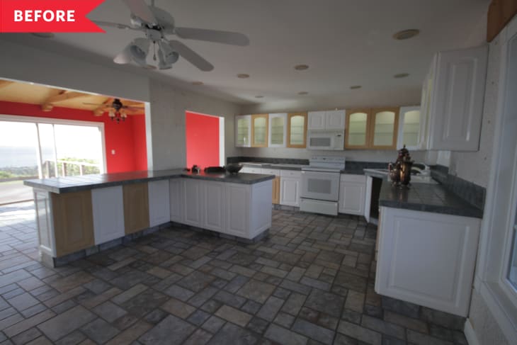 Before: Kitchen with L-shaped counters and walls dividing living/kitchen areas
