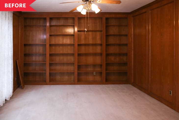 Before: Room with brown built-in shelving and off-white carpeting