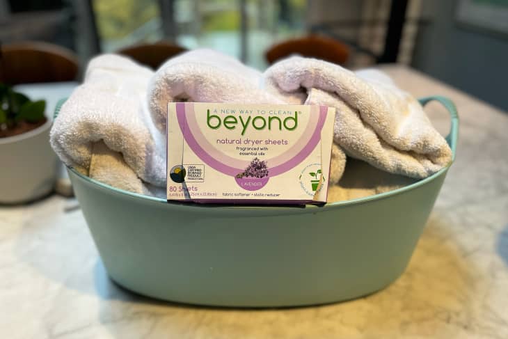 Beyond Natural Dryer Sheets sitting with some towels on a table