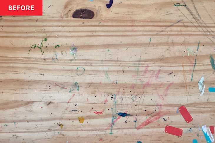 Permanent marker on wooden surface.