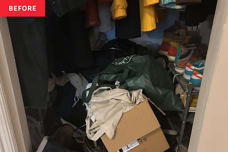 A cluttered closet filled with bags, shoes, and clothing items, including a cardboard box and various fabrics.