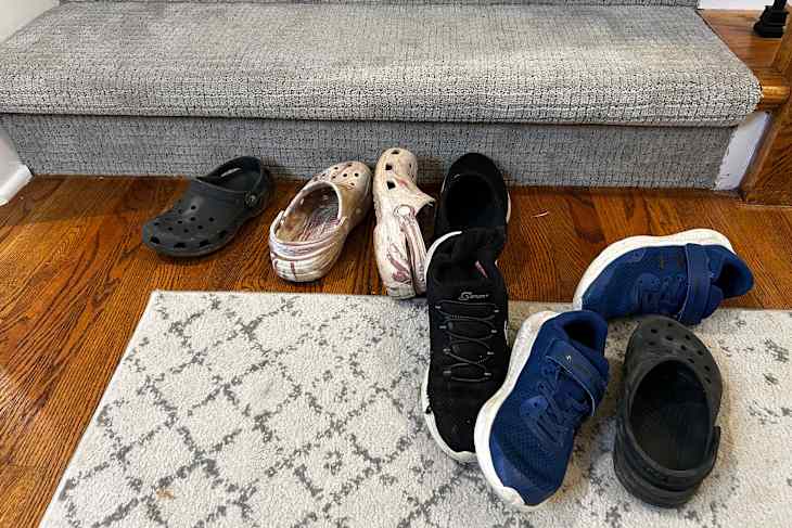 Shoes scattered on floor.