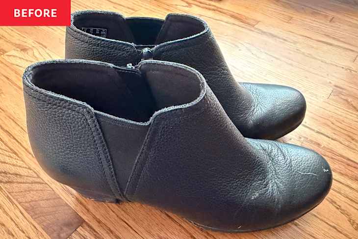 Black leather boots before cleaning with banana peel.
