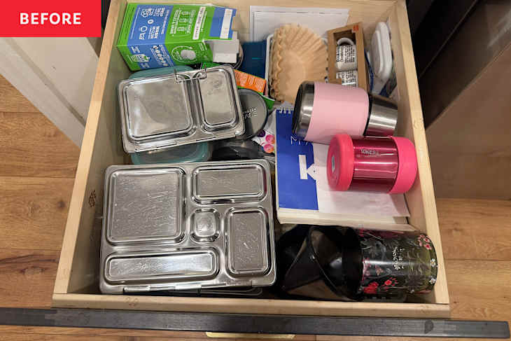 Kitchen drawer before decluttering using AI.
