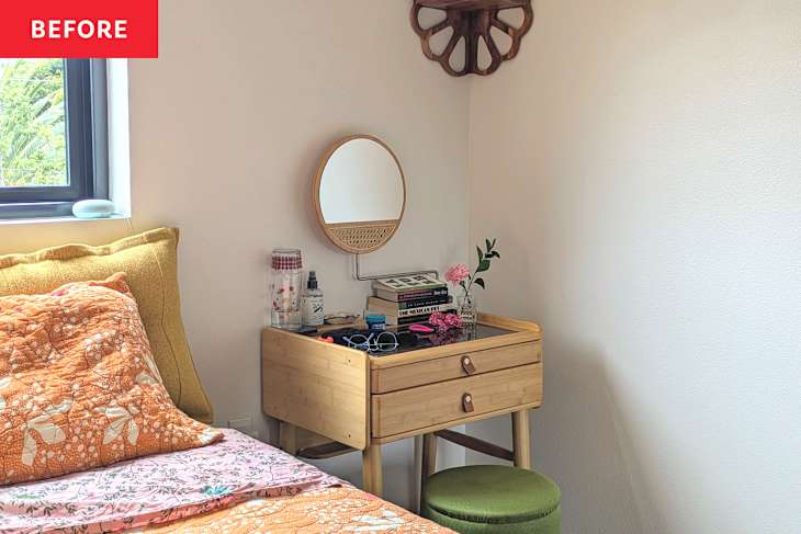 Cozy bedroom corner with a yellow pillow, a bamboo nightstand, a round mirror, and a green stool.