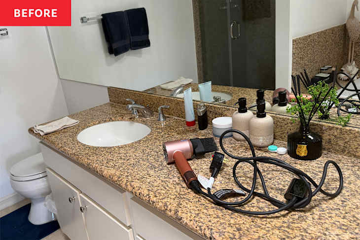 Blowdryer on bathroom countertop.