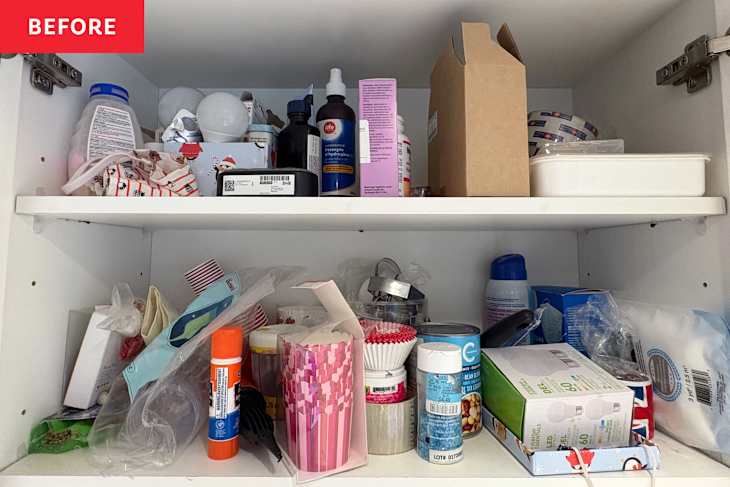 Cluttered cabinet shelves filled with various household items, including bottles, containers, and craft supplies.
