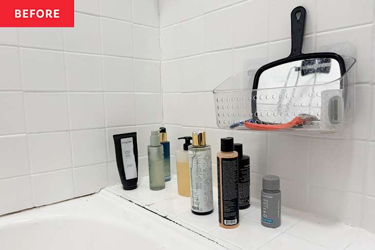 Toiletries in shower before organizing.