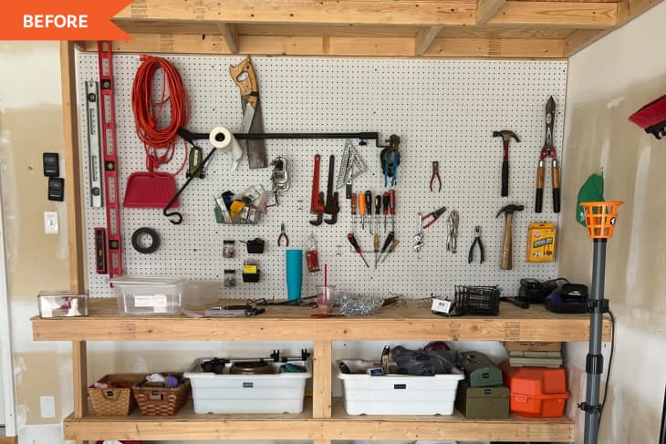 Organized garage pegboard with tools, including hammers, pliers, and screwdrivers, above a wooden workbench with storage bins.