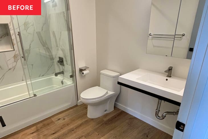 White bathroom before adding storage and organization items.