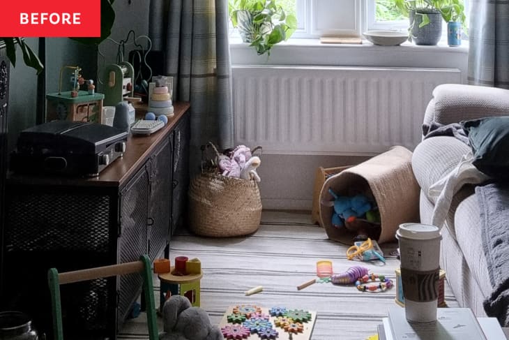 family/living room before being cleaned. Untidy floor, sofa, etc