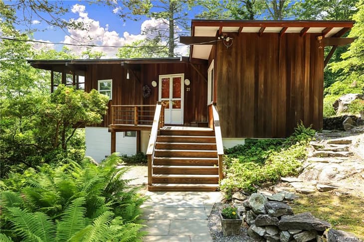 Wooden exterior of mid century modern country home.