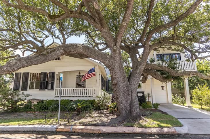 Exterior of white Craftsman style house