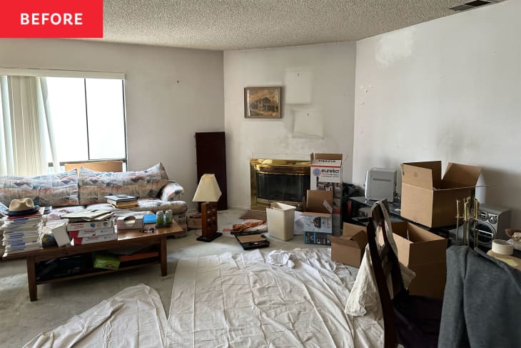 Messy living room before renovation.