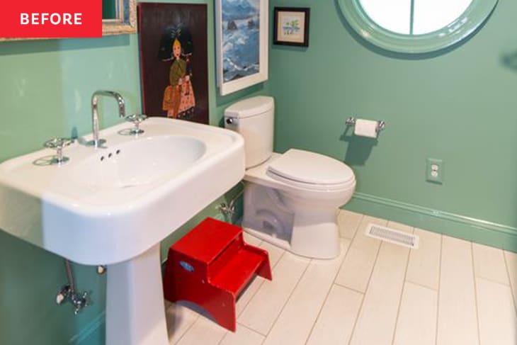 Green bathroom with gallery wall before renovation.