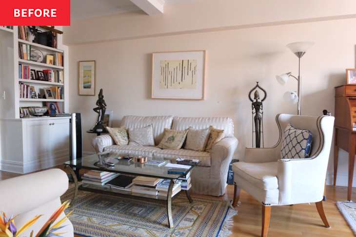 White sofa in living room before renovation.