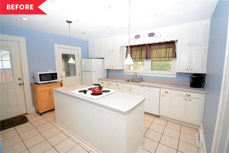 Before: Outdated kitchen with white cabinetry and appliances