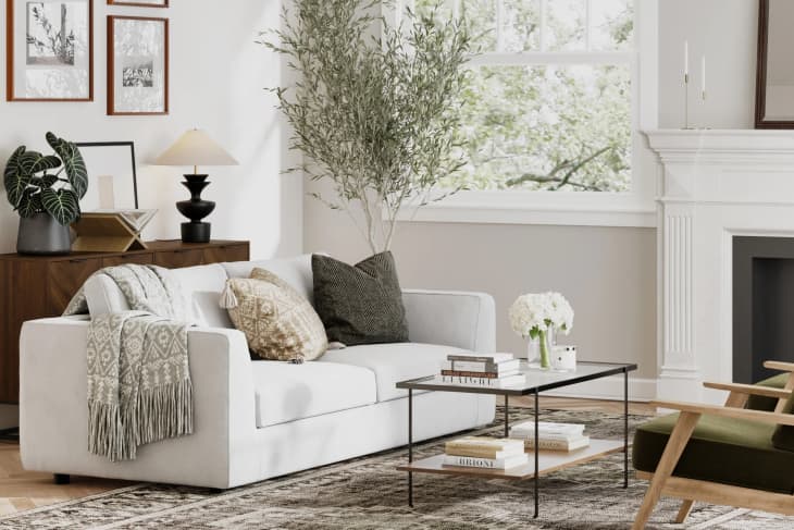 White living room with Nathan James sofa, coffee table, other furniture
