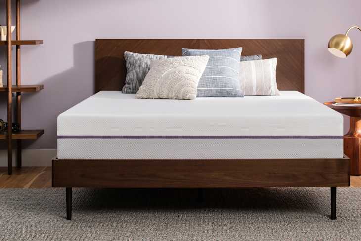 Purple mattress on bed