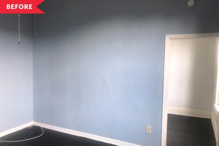 Bare blue living room before shot