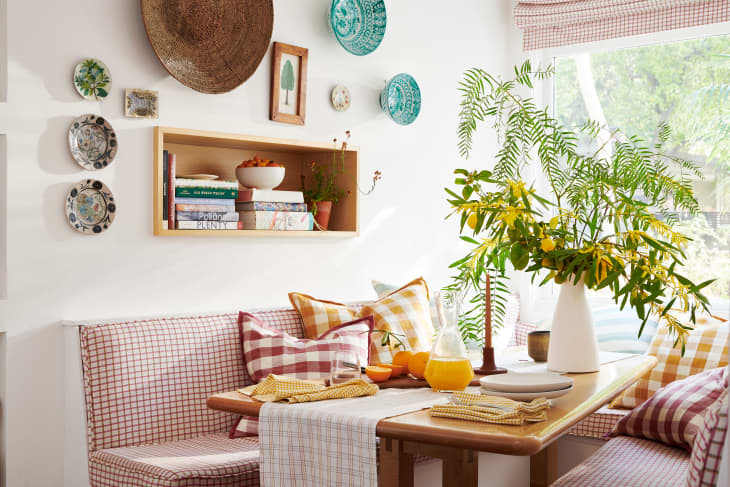 breakfast nook with printed pillows and table runner