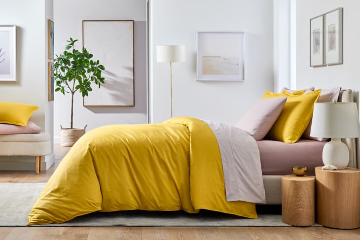 Bed with Apartment Therapy + Cammie Collection bedding in Yellow Jasmine