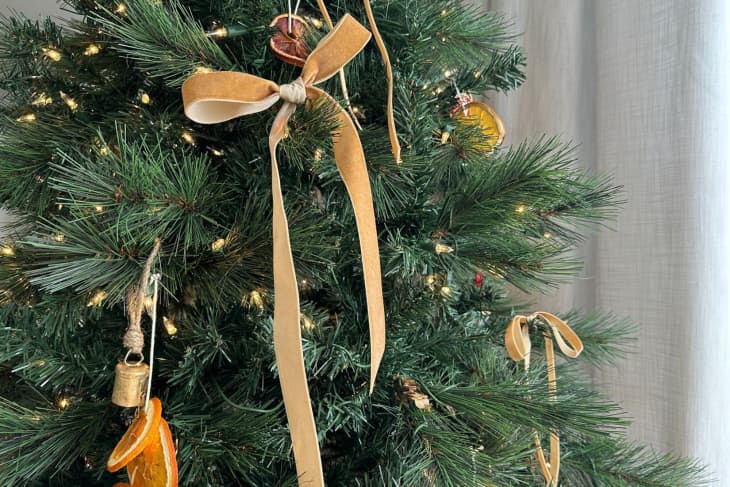 Christmas tree with hand-tied gold velvet bows