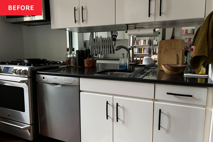 Knives on magnetic strip in kitchen before applying peel and stick backsplash.