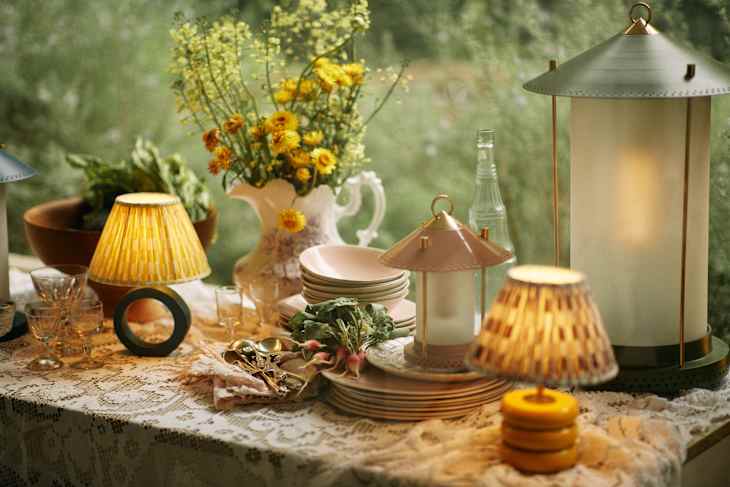 Pooky outdoor lighting set up on table.