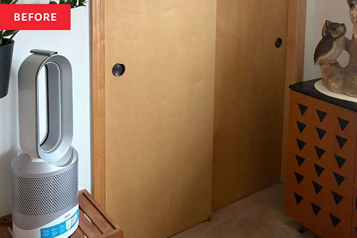 Wooden closet door before putting up decorative curtains.