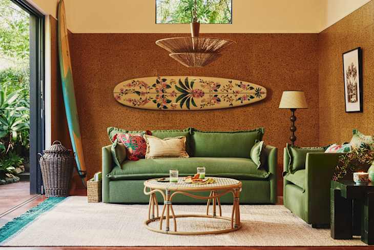 Living room featuring the Anthropologie x FARM Rio Collaboration surf board and pillows