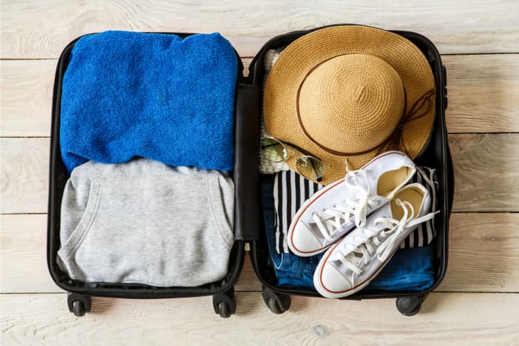 Packing clothes in suitcase clearance