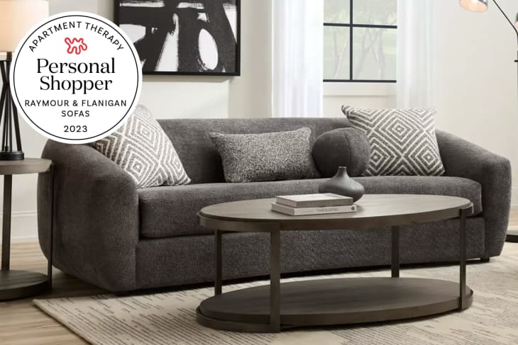 Product photo of a Raymour &amp; Flanigan Farrah Sofa in living room with a Personal Shopper seal in the upper left corner