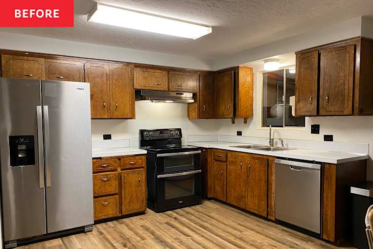 Wooden cabinets in kitchen before renovation.