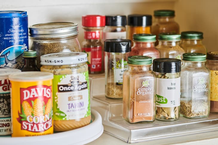 Spices and various cooking ingredients organized in pantry