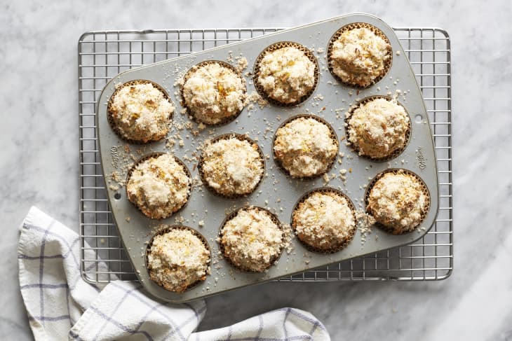Muffins topped with sugar in muffin pan.