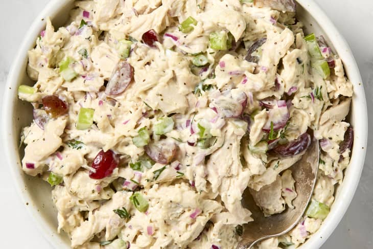 overhead shot of chicken salad in a white bowl.