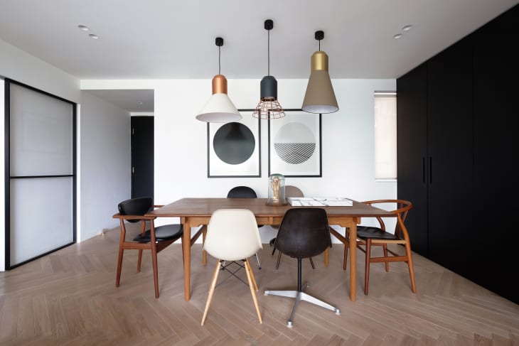 a brown and black kitchen with color block design