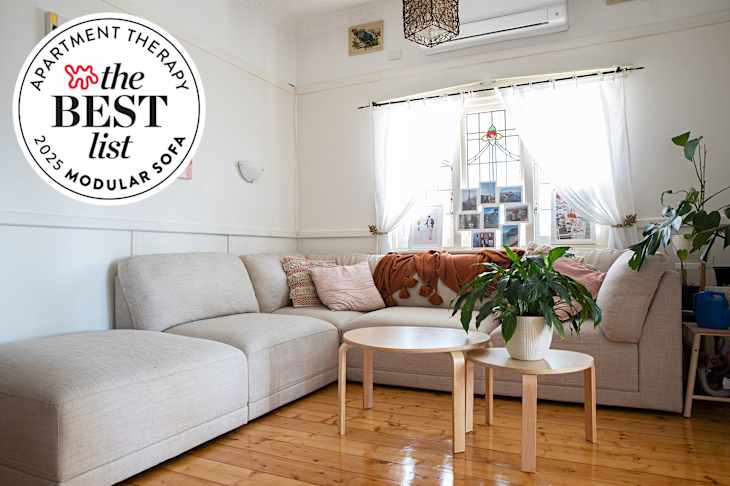 Modular sofa in living room with Best List seal in left corner.
