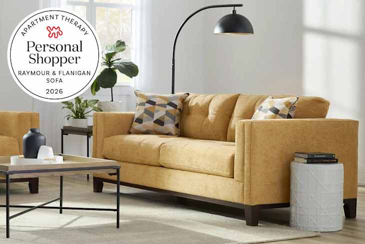 Raymour & Flanigan sofa in living room with personal shopper seal in upper left corner