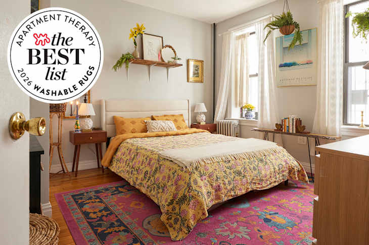 Bedroom with colorful rug and Best List Seal on top left corner.