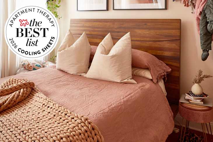 Neatly made bed with Best List seal in upper left corner.