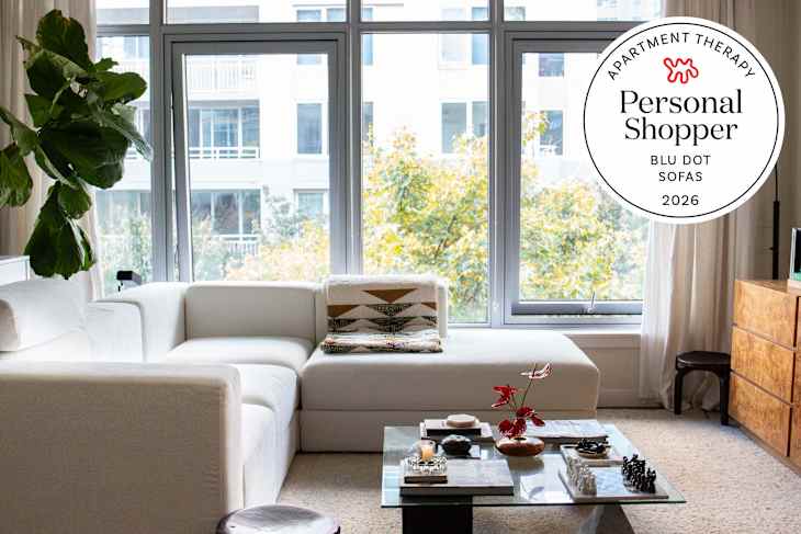 White modern sectional sofa in living room with personal shopper seal in upper right