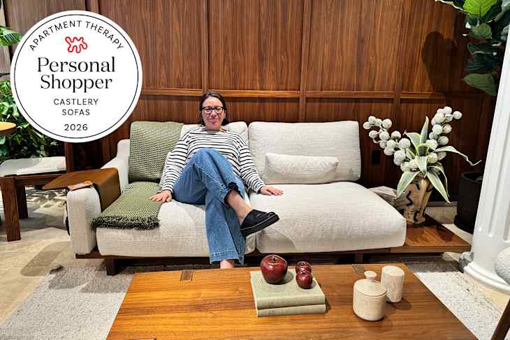 Woman sitting on sofa at Castlery.