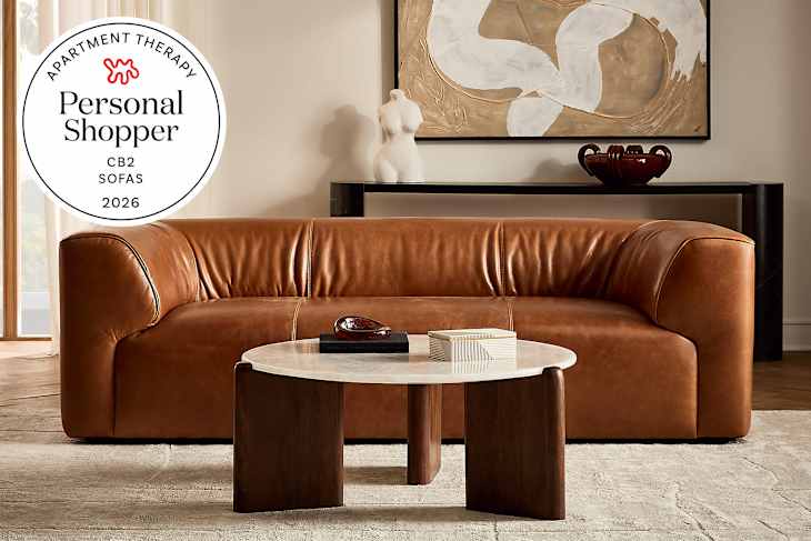 CB2 sofa in living room with personal shopper seal in upper left