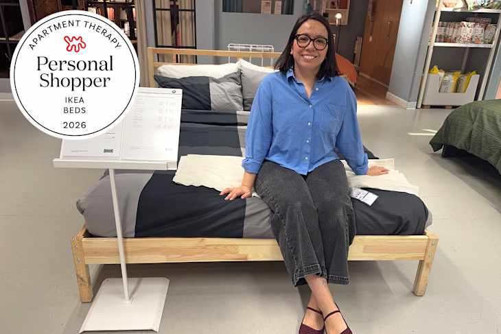 Furniture tester sitting on IKEA bed in store with personal shopper seal in upper left