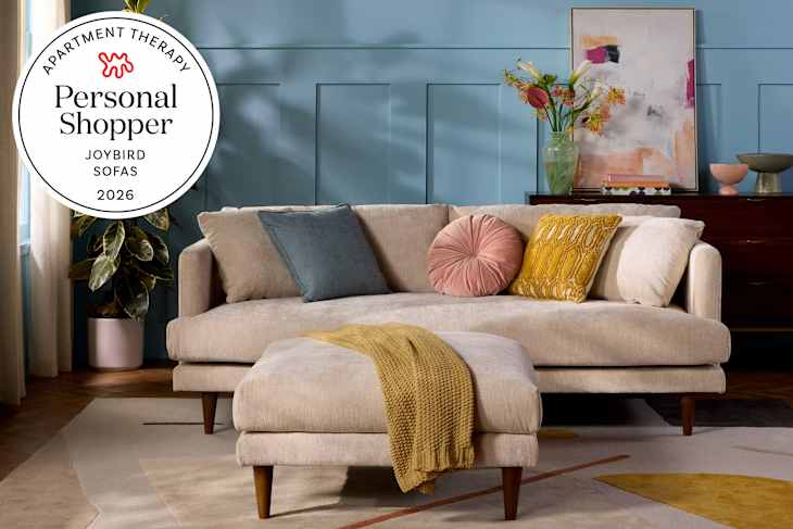 Joybird Lewis sofa in blue living room with personal shopper seal in upper left