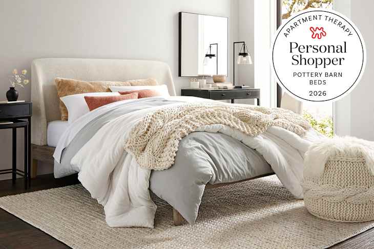 Pottery Barn bed in bright airy bedroom with personal shopper seal in upper right